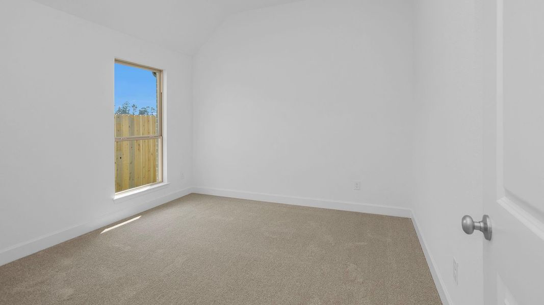 Spacious, unfurnished interior of a new home in Artavia 50', Conroe (Image 11).