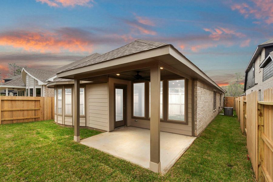 Exterior details and patio area of a home in Grand Central Park, Conroe (Image 23).