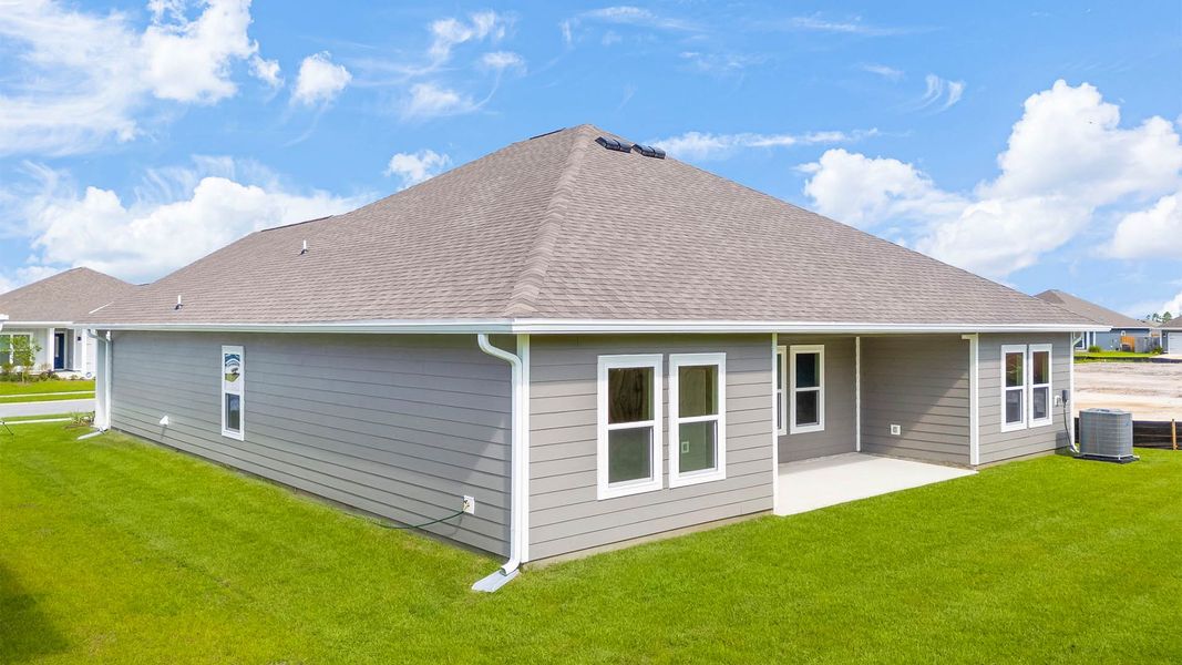 Front exterior of a new home in Titus Park, Panama City, FL, highlighting curb appeal (Image 16).