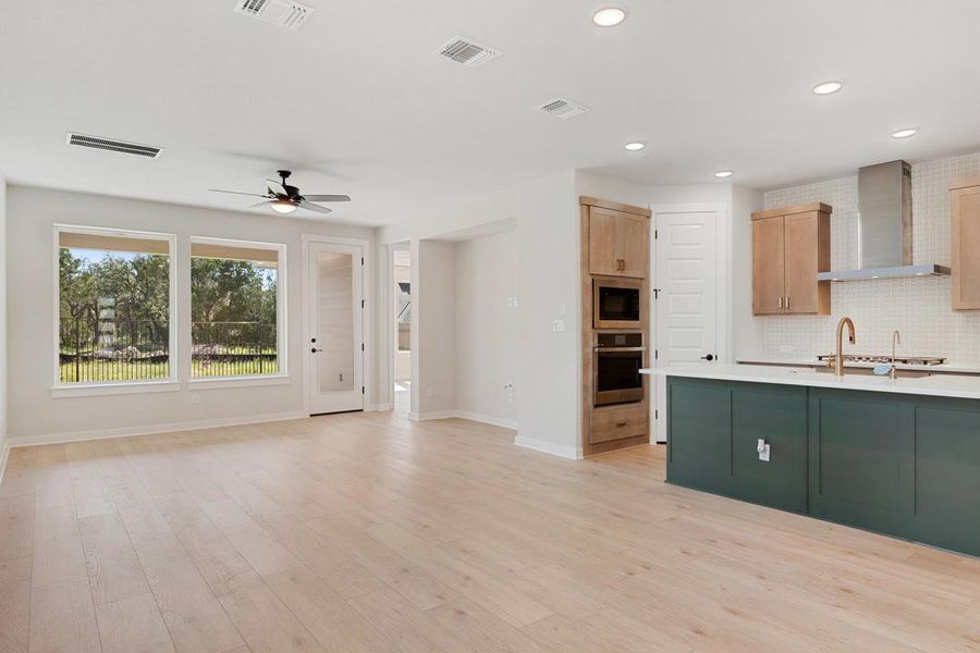 Furnished interior view inside a new home in Terrace Collection at Lariat, Liberty Hill (Image 11). Furnished interior view inside a new home in Terrace Collection at Lariat, Liberty Hill (Image 11).