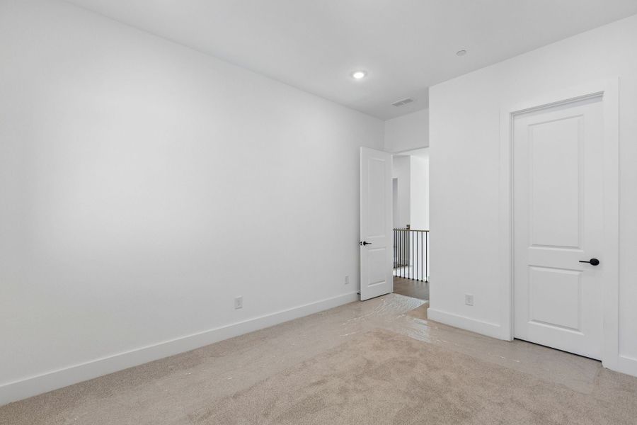 Representative unfurnished interior of a home built from the Roosevelt by Centre Living Homes in Newman Village Townhomes, Frisco (Image 22).