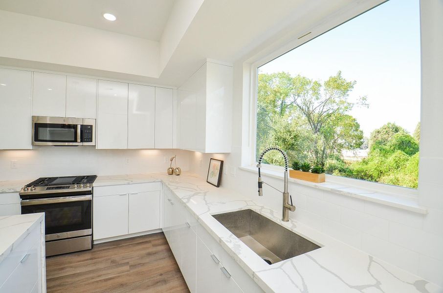 Kitchen (Sample photo from similar floor plan built by the builder)