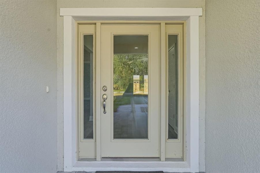 Exterior details and patio area of a home in , New Smyrna Beach (Image 25).