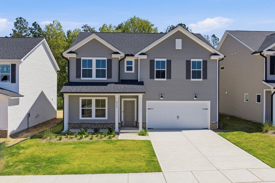 Front exterior of a new home in Wimberly, Willow Spring, NC, highlighting curb appeal (Image 28).
