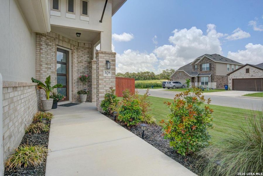Exterior details and patio area of a home in Megan's Landing, Castroville (Image 22).