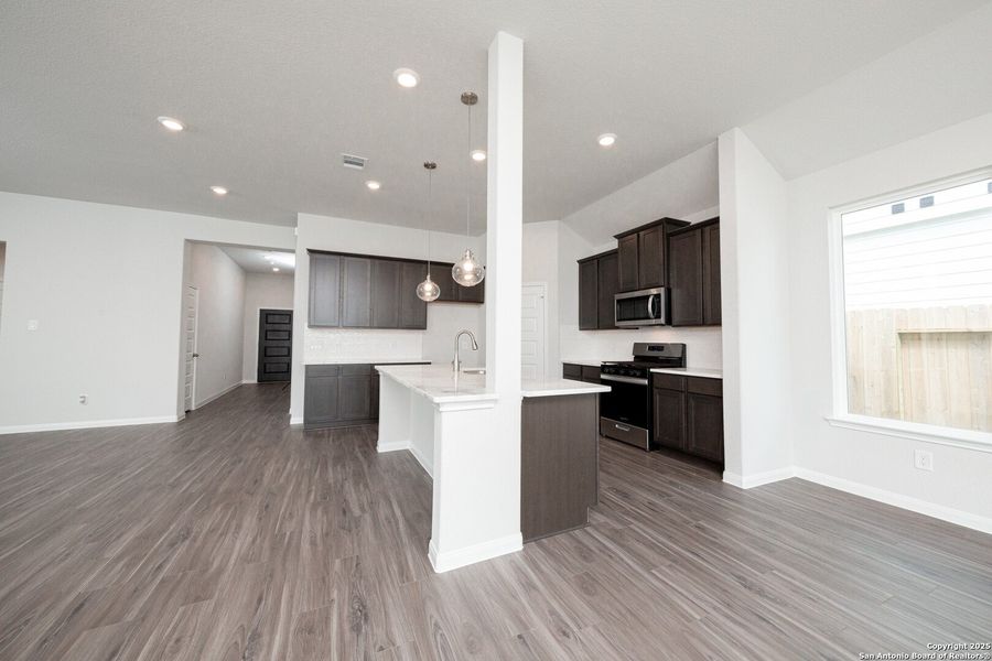 Furnished interior view inside a new home in Cinco Lakes, San Antonio (Image 7).