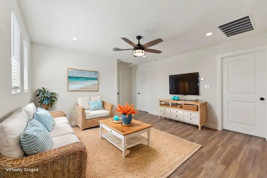 Virtually Staged Family room featuring visible vents, a ceiling fan, recessed lighting, light wood-style floors, and baseboards