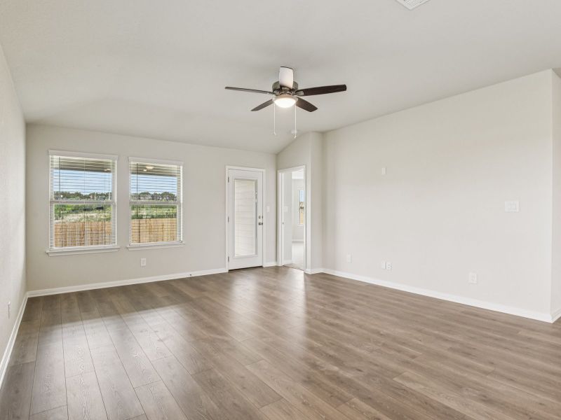 Living room in the Oleander floorplan at a Meritage Homes community.