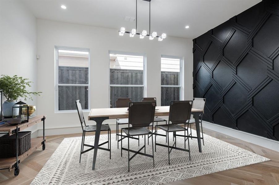 Dining space featuring recessed lighting and baseboards Dining space featuring recessed lighting and baseboards
