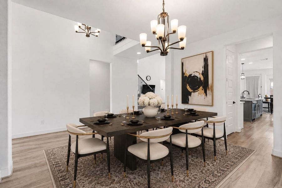 Make memories gathered around the table with your family and friends! Featuring modern lighting and conveniently located in close proximity to the kitchen for easy access. *This photo has been virtually staged.