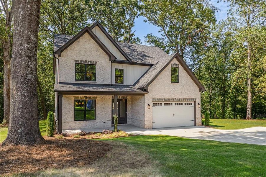 Front exterior of a new home in , Buford, GA, highlighting curb appeal (Image 24).