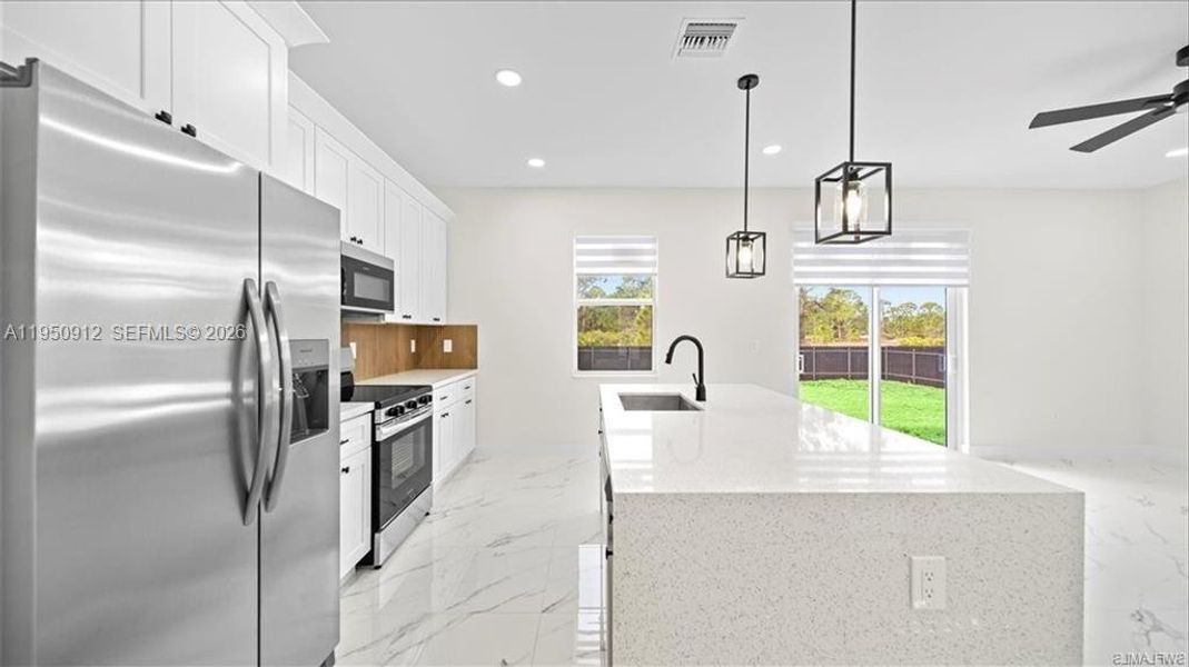 Furnished interior view inside a new home in , Lehigh Acres (Image 6).