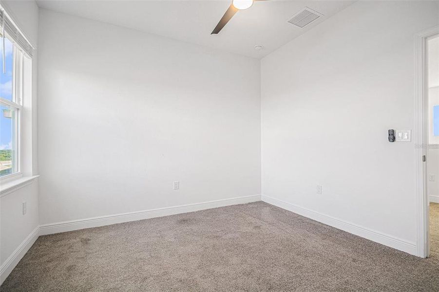 Spacious, unfurnished interior of a new home in Hills of Minneola, Minneola (Image 30).