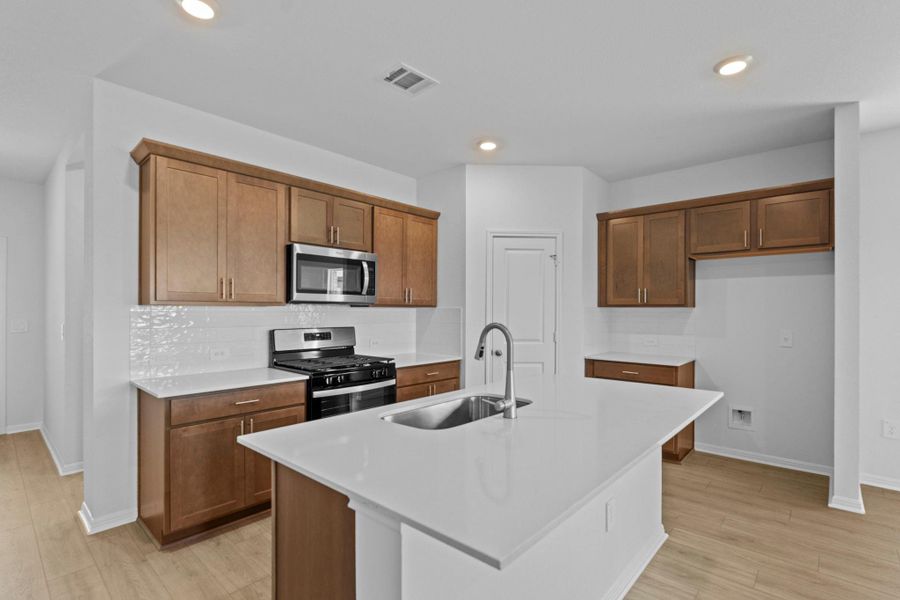 Furnished interior view inside a new home in Palomino, Manor (Image 9).