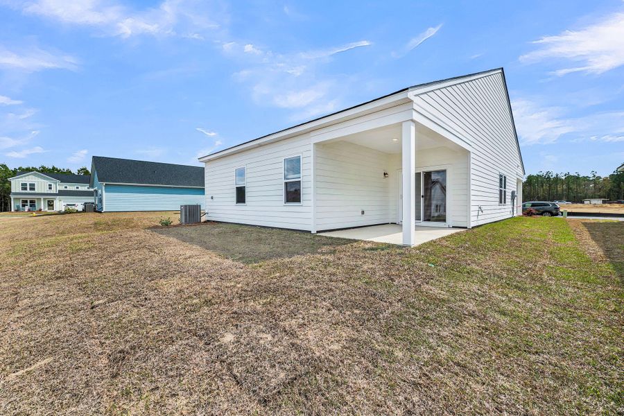 Exterior details and patio area of a home in , Ravenel (Image 21).