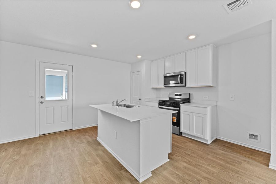 Furnished interior view inside a new home in Prairie Lakes, Buda (Image 5).