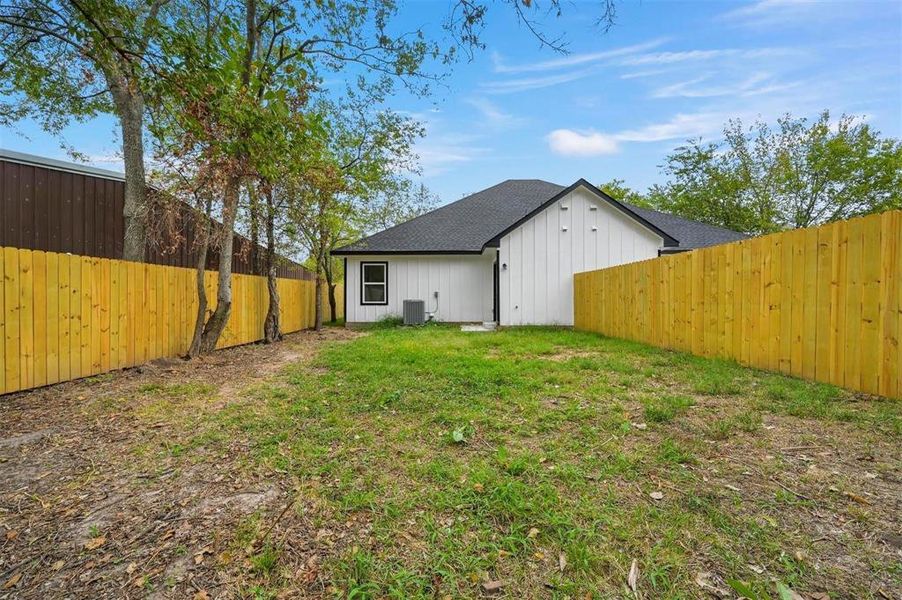 Privacy fenced backyard for each side