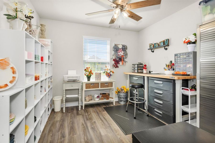 This is bedroom #2. It is perfectly located just off the grand entry and to the left of the Secondary Bathroom. Currently being used as a very well stocked and organized craft room. This is bedroom #2. It is perfectly located just off the grand entry and to the left of the Secondary Bathroom. Currently being used as a very well stocked and organized craft room.