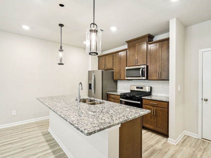 The Lancaster floorplan with the Calm Burlap interior package.