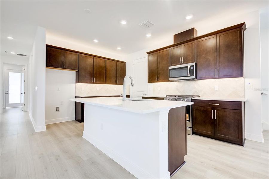 Furnished interior view inside a new home in Bungalow Walk at Lakewood Ranch, Sarasota (Image 8).