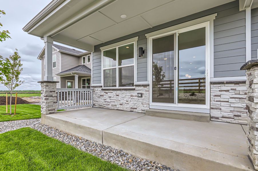 Exterior details and patio area of a home in Barefoot Lakes, Longmont (Image 23).