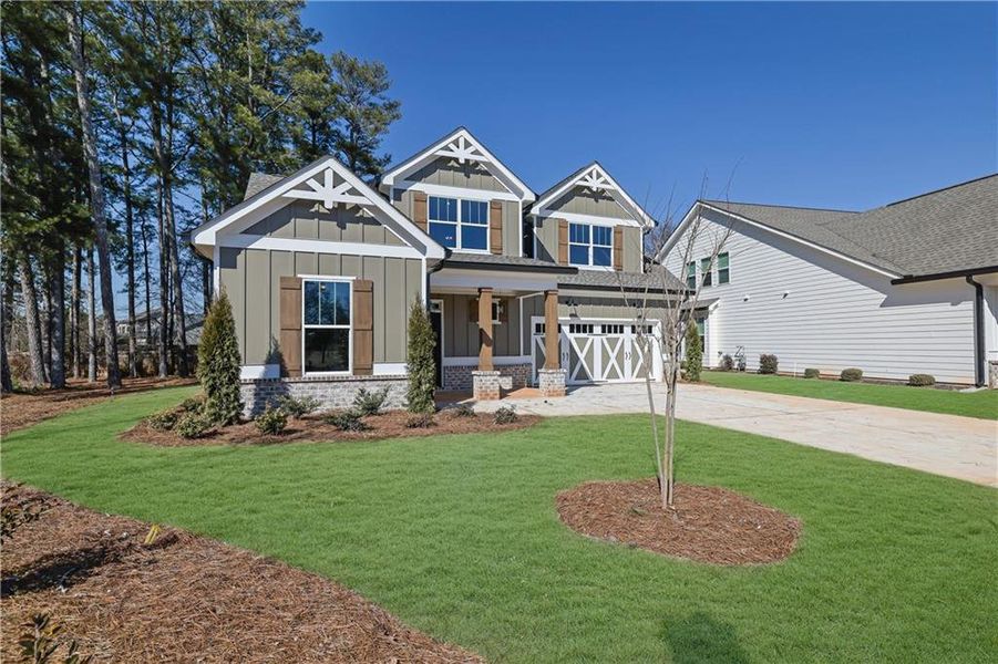 Front exterior of a new home in , Canton, GA, highlighting curb appeal (Image 25).