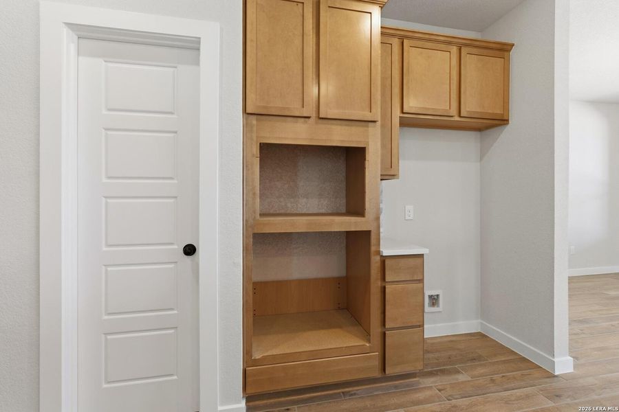 Furnished interior view inside a new home in Alamo Estates, San Antonio (Image 12).