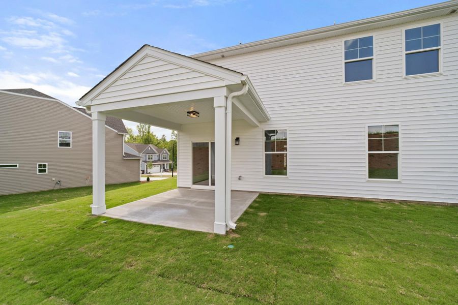 Front exterior of a new home in Cottages at Piper Village, Trinity, NC, highlighting curb appeal (Image 22).