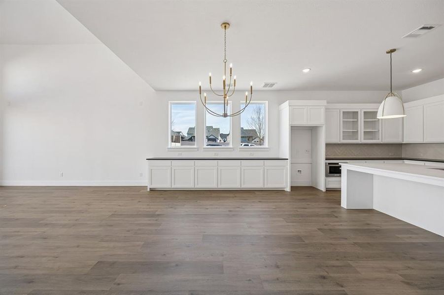 Offering built in cabinets in the dining room, you'll find entertaining is a breeze in this outstanding floor plan!