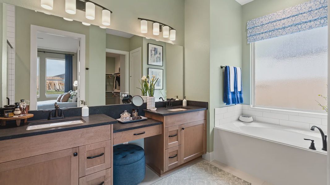 Representative furnished interior of a home built from the Hillcrest by Chesmar Homes in Artavia, Conroe (Image 24).