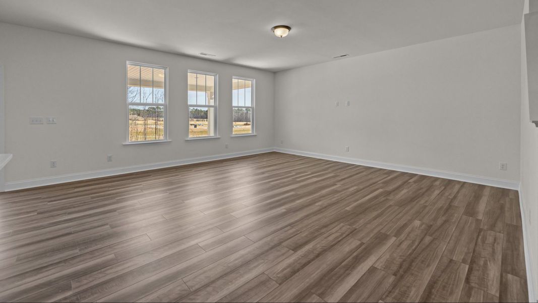 The Norris Plan by DRB Homes in Michaux Gardens - Living Space (Representative Photo) The Norris Plan by DRB Homes in Michaux Gardens - Living Space (Representative Photo)