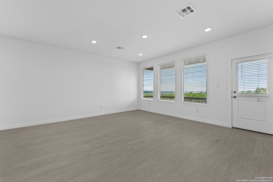 Spacious, unfurnished interior of a new home in Waterwheel: Coastline Collection, San Antonio (Image 16).