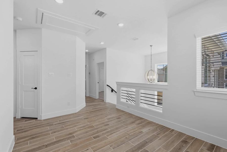 Representative unfurnished interior of a home built from the Dillon by Chesmar Homes in Sienna Courtyard, Missouri City (Image 18).