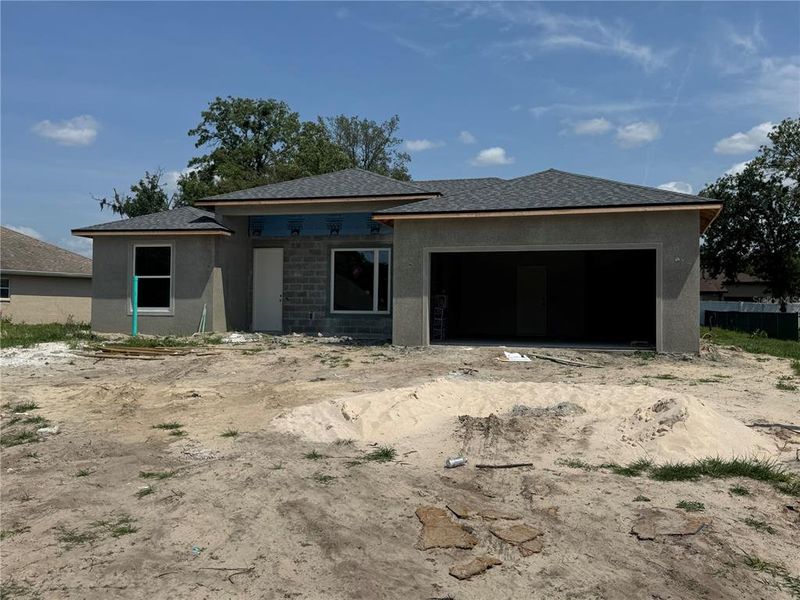 Front of the home under construction Front of the home under construction