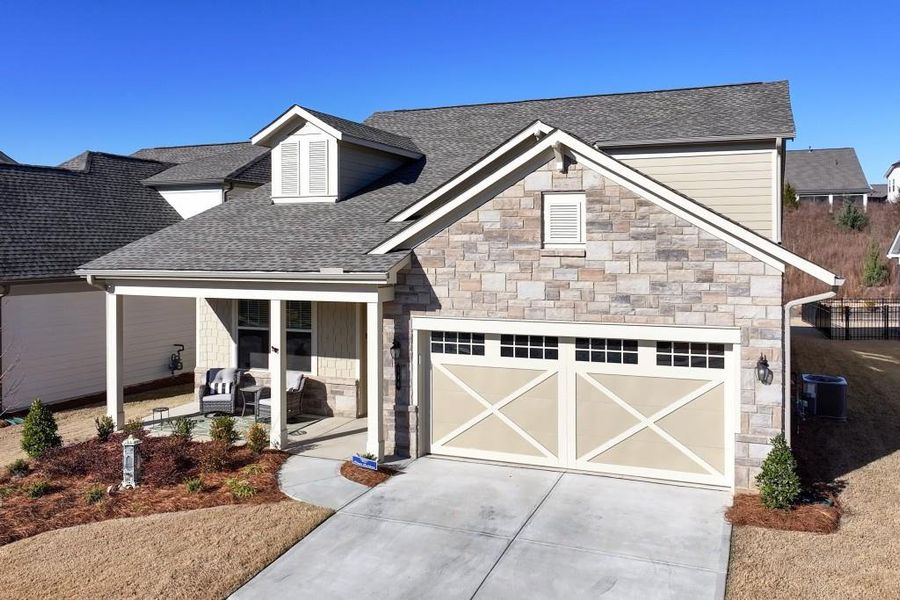 Front exterior of a new home in , Hoschton, GA, highlighting curb appeal (Image 27).