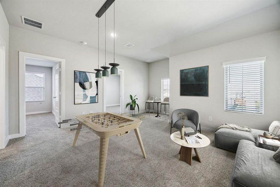 Game Room in the Holden home plan by Trophy Signature Homes – REPRESENTATIVE PHOTO