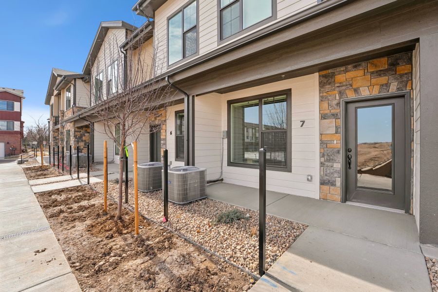 Exterior details and patio area of a home in Northfield at Old Town, Fort Collins (Image 1). Exterior details and patio area of a home in Northfield at Old Town, Fort Collins (Image 1).