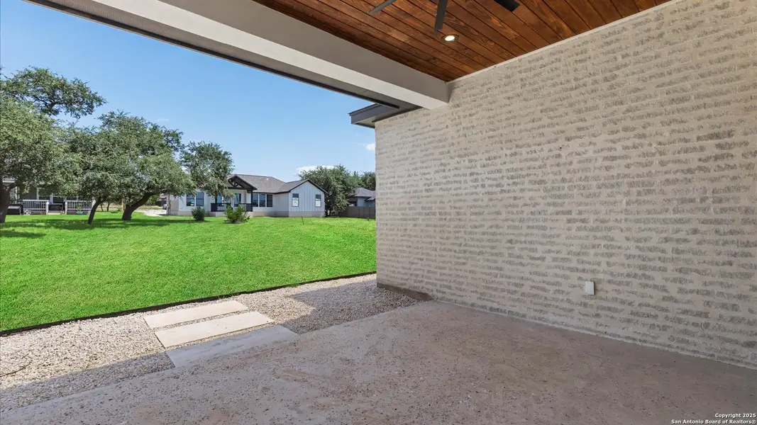 Exterior details and patio area of a home in , Blanco (Image 3).