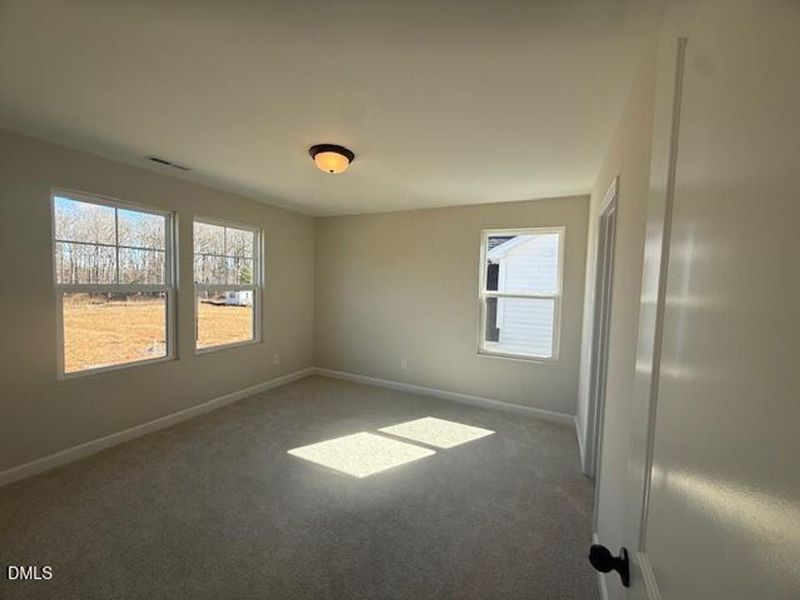 Spacious, unfurnished interior of a new home in Woodland Crossing, Zebulon (Image 15).