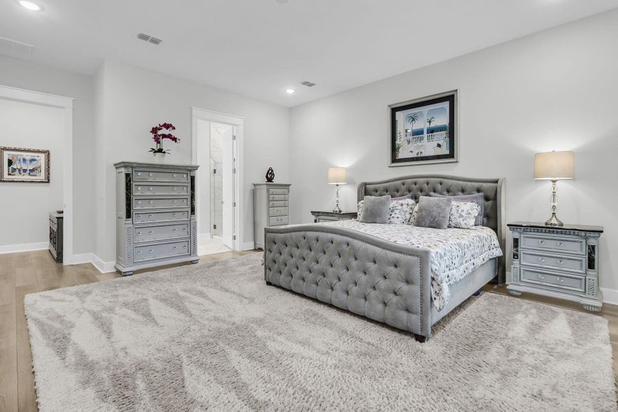 Furnished interior view inside a new home in K. Hovnanian's® Four Seasons at Lakes of Cane Bay, Summerville (Image 19).