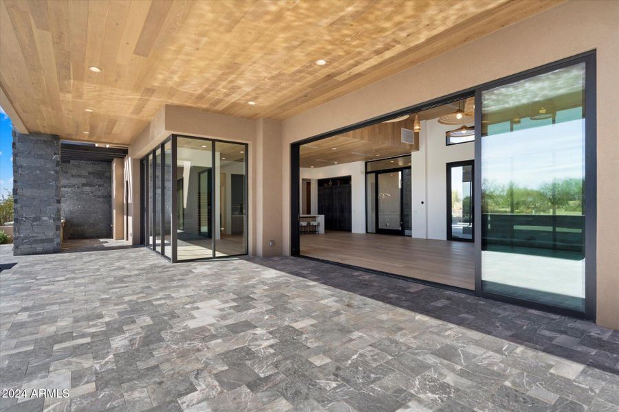 Relax Under Expansive Covered Patio