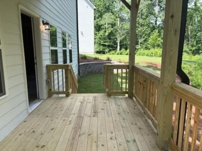 Front exterior of a new home in Riverwood, Dallas, GA, highlighting curb appeal (Image 114). Front exterior of a new home in Riverwood, Dallas, GA, highlighting curb appeal (Image 114).