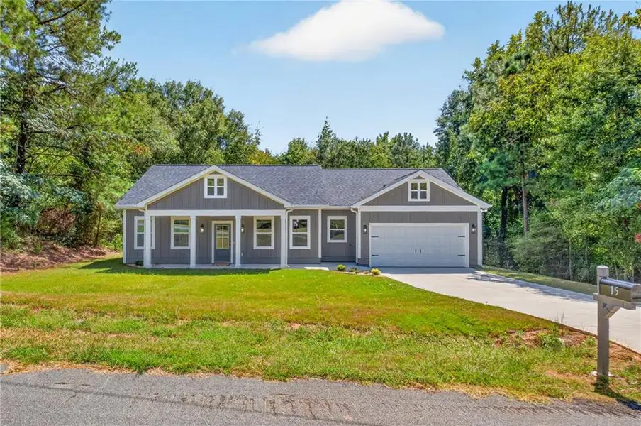 Front exterior of a new home in , Covington, GA, highlighting curb appeal (Image 19).