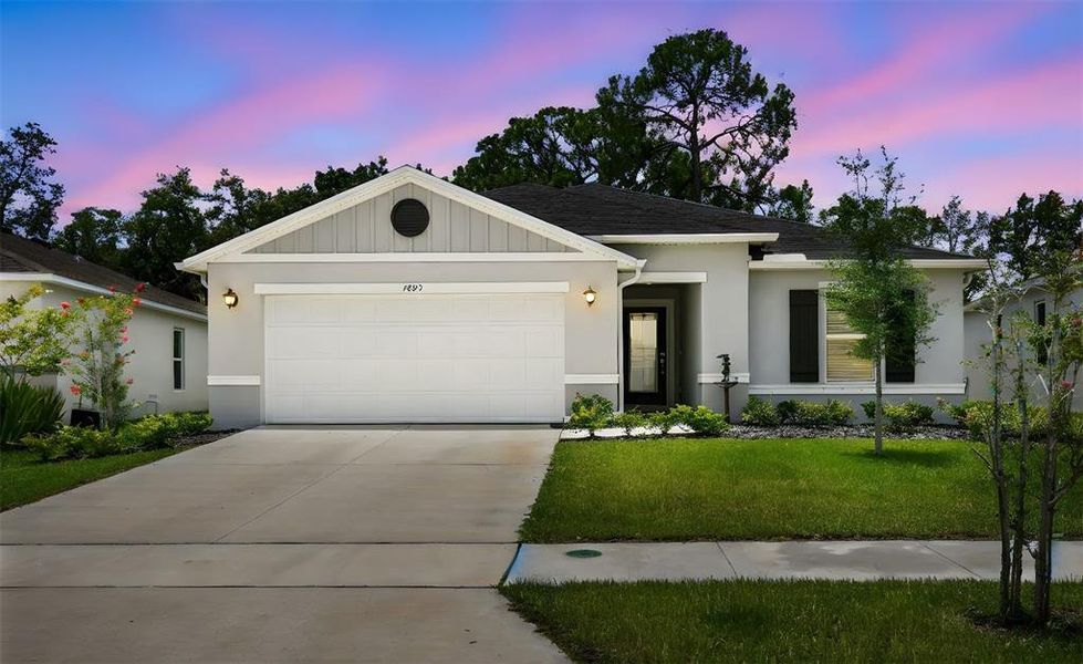 Front exterior of a new home in , Titusville, FL, highlighting curb appeal (Image 2).