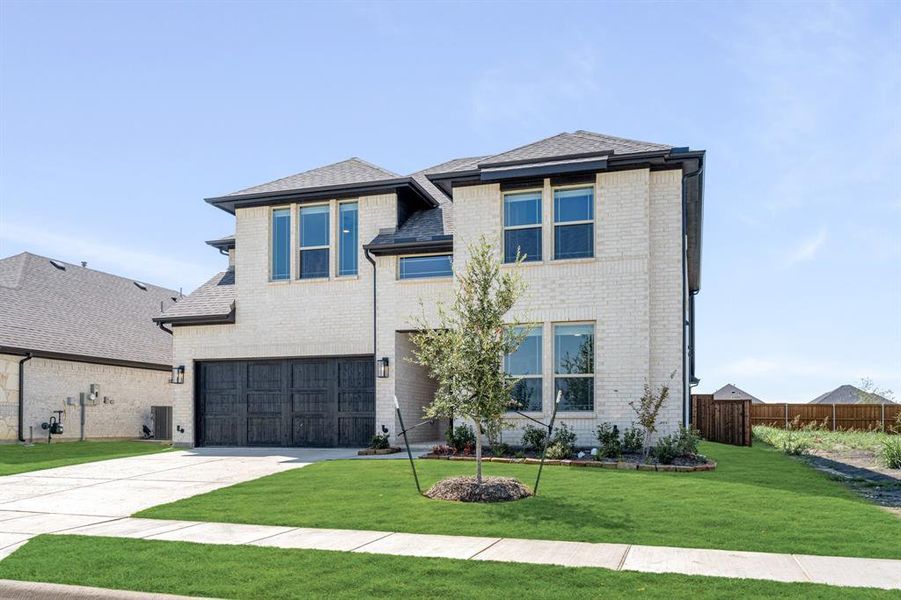 Front exterior of a new home in Devonshire Classic 50-55, Forney, TX, highlighting curb appeal (Image 26). Front exterior of a new home in Devonshire Classic 50-55, Forney, TX, highlighting curb appeal (Image 26).