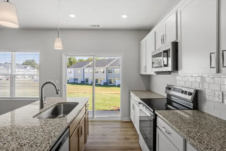 Furnished interior view inside a new home in West Main Townhomes, Sanford (Image 9). Furnished interior view inside a new home in West Main Townhomes, Sanford (Image 9).
