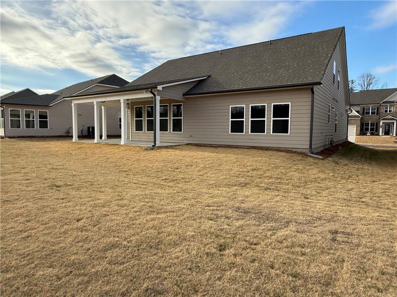 Exterior details and patio area of a home in Ponderosa Farms Reserve, Gainesville (Image 3).