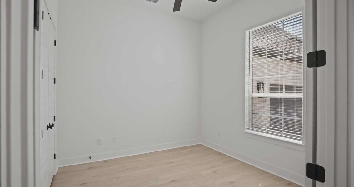 Representative unfurnished interior of a home built from the Farris by Chesmar Homes in Gregg Ranch, Marble Falls (Image 11).