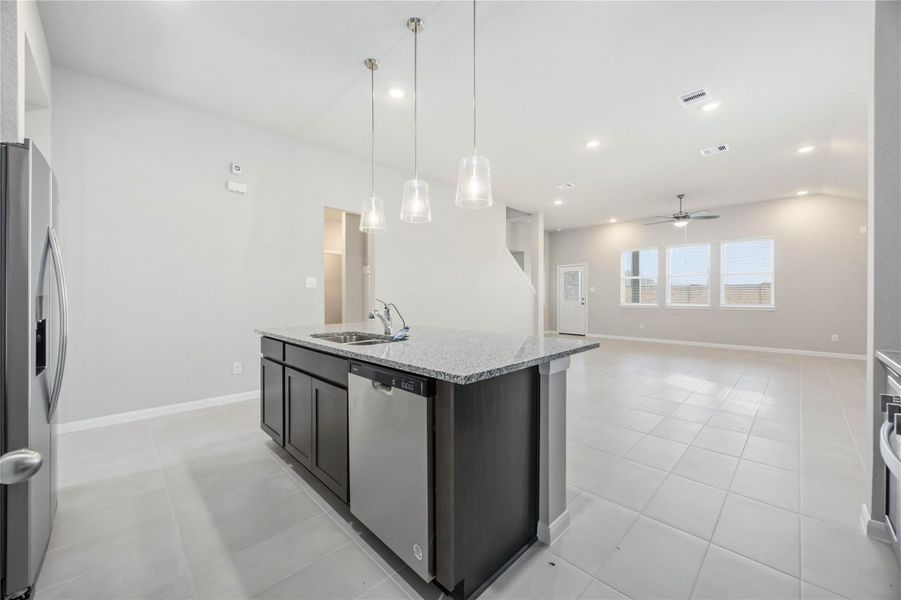Furnished interior view inside a new home in Sunterra, Katy (Image 10).