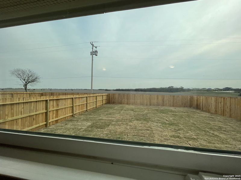 Exterior details and patio area of a home in Whisper Falls, San Antonio (Image 2).